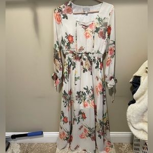 Great dress, has flowers and chest piece